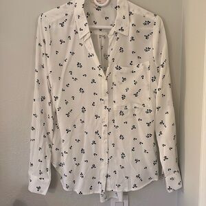 White with black pattern button down and front pocket. Como vintage size small